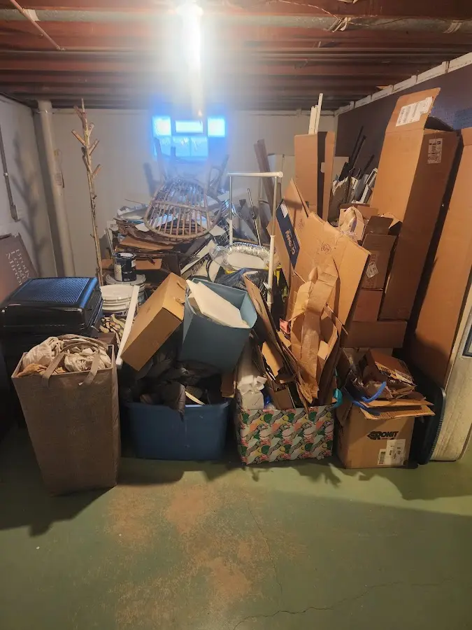 Roll-off dumpster container at job site for Roll Off Dumpster Rental in Sienna